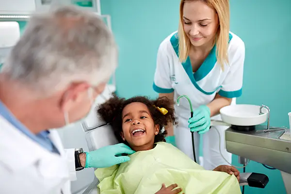 Image of a smiling child before dental treatment at Arlington Pediatric Dentistry in Arlington, WA.