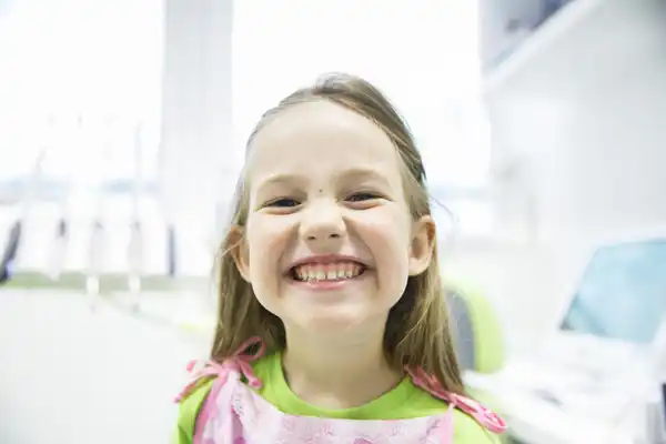 Image of a smiling girl.